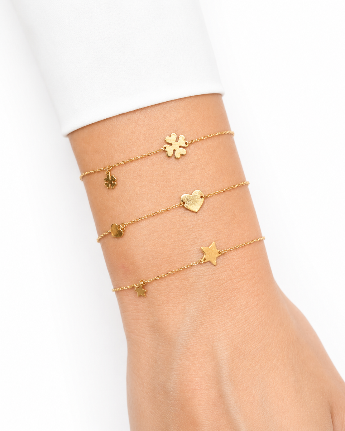 Bracciale in Oro 9kt con charms Stella, Cuore e Quadrifoglio