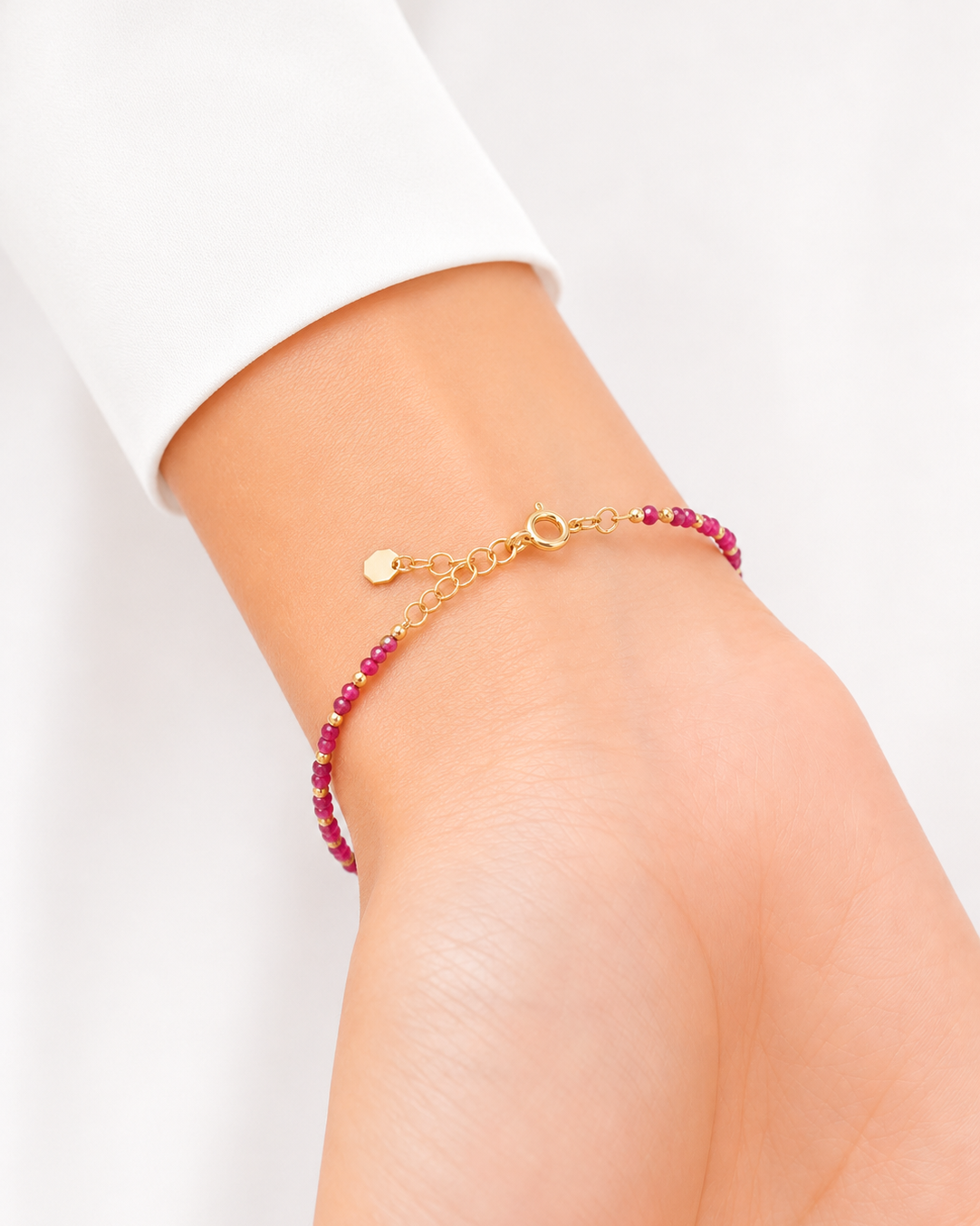 Bracciale in Oro 9kt rigido con Zirconi Fucsia