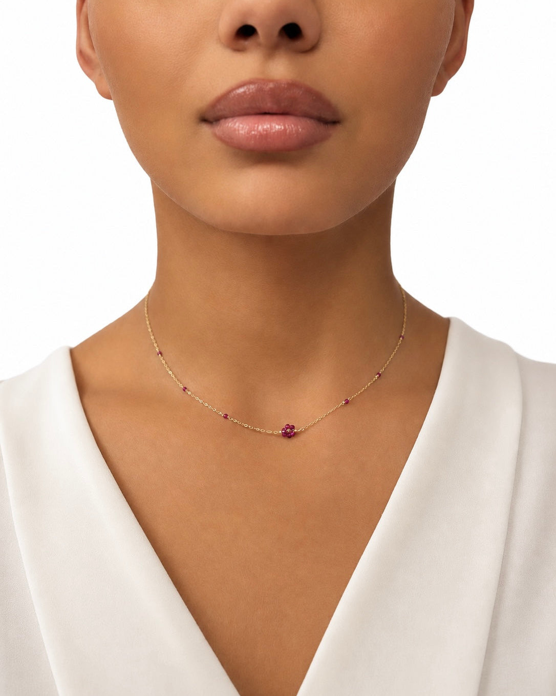 Girocollo in Oro 9kt con Fiorellino Fucsia