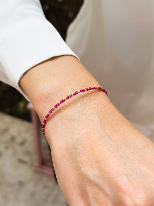 Bracciale in Oro 9kt rigido con Zirconi Fucsia